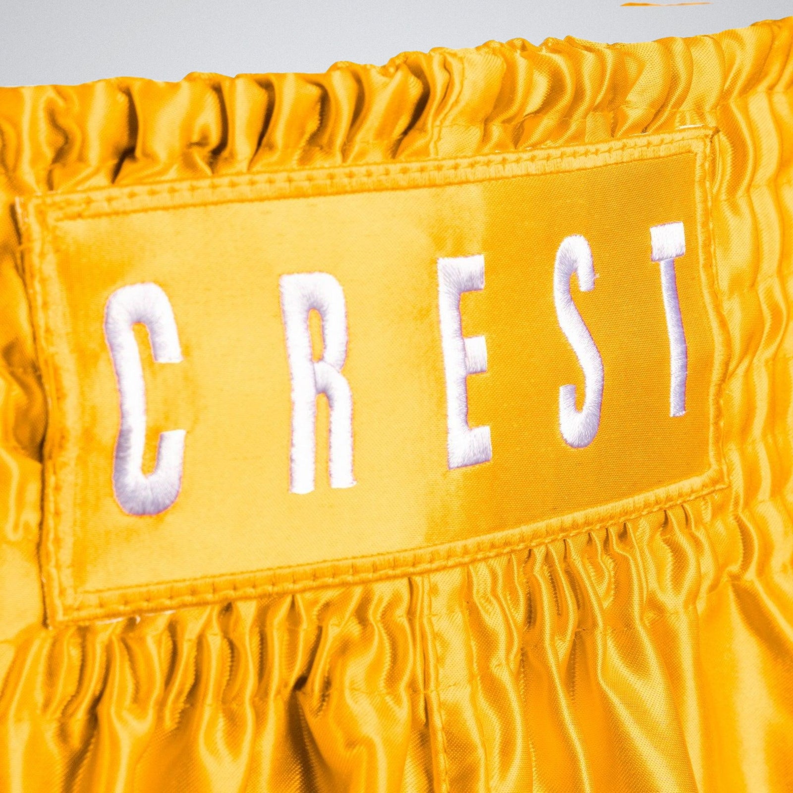 Shorts "C R E S T" - Yellow