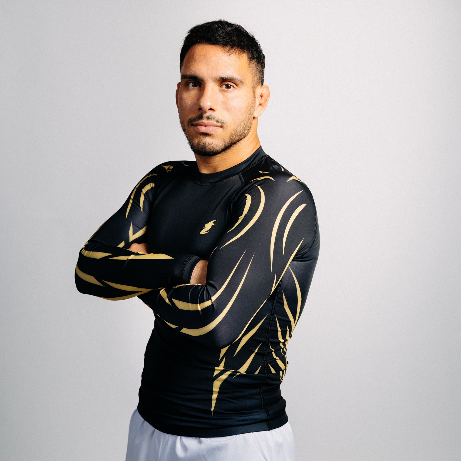 Pitkähihainen Rash Guard "ARROW" Series | Kultainen / Musta